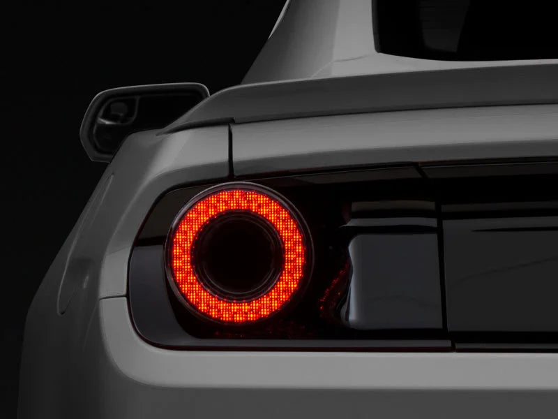 Raxiom 15-22 Ford Mustang Halo LED Tail Lights - Gloss Black Housing (Smoked Lens) - Side View