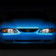 Load image into Gallery viewer, Raxiom 94-98 Ford Mustang Axial Series Cobra Style Headlights- Chrome Housing (Clear Lens) - Additional View 7