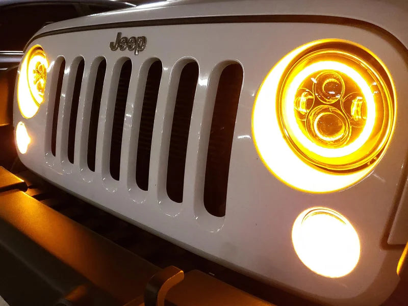 Raxiom 97-18 Jeep Wrangler TJ/JK Axial Halo Headlights w/ DRL Amber Signals- Blk Hsng (Clear Lens) - Installation View