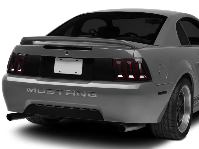 Raxiom 99-04 Ford Mustang Excluding 99-01 Cobra Icon LED Tail Lights- Black Housing (Smoked Lens) - Side View