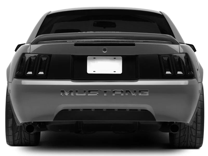 Raxiom 99-04 Ford Mustang Excluding 99-01 Cobra Icon LED Tail Lights- Black Housing (Smoked Lens) - Installation View