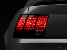 Load image into Gallery viewer, Raxiom 99-04 Ford Mustang Excluding 99-01 Cobra Tail Lights- Black Housing (Smoked Lens) - Main Product View