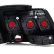 Load image into Gallery viewer, Raxiom 99-04 Ford Mustang Excluding 99-01 Cobra Tail Lights- Black Housing (Smoked Lens) - Side View