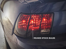 Load image into Gallery viewer, Raxiom 99-04 Ford Mustang Excluding 99-01 Cobra Tail Lights- Black Housing (Smoked Lens) - Additional View 8