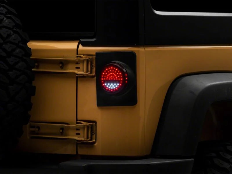 Raxiom Axial Series Halo LED Tail Lights - Black Housing (Clear Lens) fits 2007-2018 Jeep Wrangler / Wrangler JK - Side View