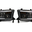 Load image into Gallery viewer, Raxiom Axial Series Headlights w/ LED Bar - Black Housing (Clear Lens) fits 2007-2013 Toyota Tundra - Installation View