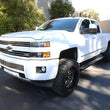 Load image into Gallery viewer, RealTruck 15-19 Chevy Silverado 25/3500HD CC Dsl 4dr VoltStep Electric Running Board Kit - Tex. Blk - Additional View 7