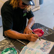Load image into Gallery viewer, Rigid Industries x SHREDDY 360-Series 4in Lights w/Wt Bcklght (2) + 6 Covers (2 Pink/2 Teal/2 Blk) - Side View