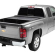 Load image into Gallery viewer, Roll-N-Lock 07-13 Chevy Silverado/Sierra 1500 XSB 67-3/4in M-Series Retractable Tonneau Cover - Side View