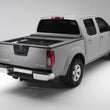Load image into Gallery viewer, Roll-N-Lock 07-13 Chevy Silverado/Sierra 1500 w/OE Rail Caps LB 96-1/4in M-Series Tonneau Cover - Installation View