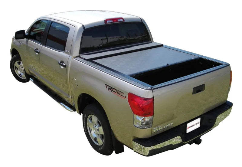 Roll-N-Lock 07-18 Toyota Tundra Regular Cab/Double Cab SB 77in M-Series Retractable Tonneau Cover - Side View
