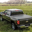 Load image into Gallery viewer, Roll-N-Lock 07-18 Toyota Tundra Regular Cab/Double Cab SB 77in M-Series Retractable Tonneau Cover - Back View