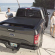 Load image into Gallery viewer, Roll-N-Lock 09-14 Ford F-150 67in E-Series Retractable Tonneau Cover - Installation View