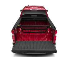 Load image into Gallery viewer, Roll-N-Lock 14-18 Chevy Silverado/Sierra 1500 SB 77-3/8in Cargo Manager - Back View