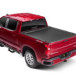 Load image into Gallery viewer, Roll-N-Lock 15-17 Chevy Silverado/Sierra 2500/3500 77-3/8in E-Series Retractable Tonneau Cover - Main Product View