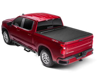 Load image into Gallery viewer, Roll-N-Lock 15-18 Chevy Silverado/Sierra 2500/3500 LB 96-3/8in M-Series Retractable Tonneau Cover - Side View