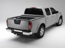 Load image into Gallery viewer, Roll-N-Lock 15-18 Chevy Silverado/Sierra 2500/3500 SB 77-3/8in M-Series Retractable Tonneau Cover - Installation View