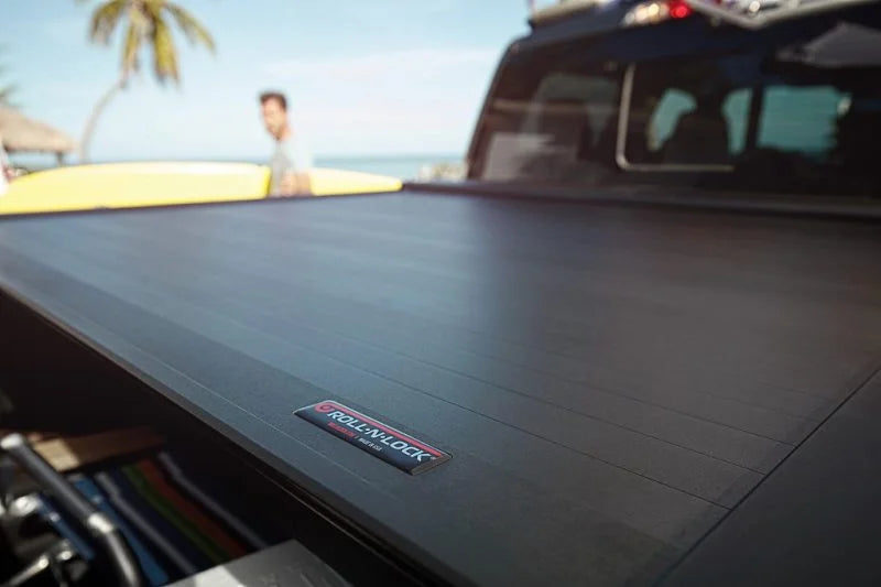 Roll-N-Lock 16-17 Toyota Tacoma Double Cab 60-1/2in E-Series Retractable Tonneau Cover - Side View