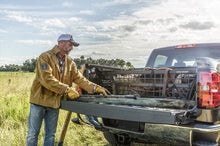 Load image into Gallery viewer, Roll-N-Lock 17-19 Ford F-250/F-350 Super Duty SB 80-3/8in Cargo Manager - Installation View