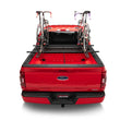 Load image into Gallery viewer, Roll-N-Lock 19-22 Chevrolet Silverado 1500 (w/o Carbon Pro - 69.9in.) A-Series XT Retractable Cover - Back View