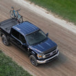 Load image into Gallery viewer, Roll-N-Lock 19-22 Chevrolet Silverado 1500 (w/o Carbon Pro - 69.9in.) M-Series XT Retractable Cover - Additional View 5