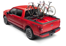 Load image into Gallery viewer, Roll-N-Lock 19-22 RAM 1500 (w/o Swing Gate - 76.3in. Bed) E-Series XT Retractable Tonneau Cover - Side View