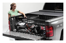 Load image into Gallery viewer, Roll-N-Lock 2002 Dodge Ram 1500 LB 96-5/8in Cargo Manager - Installation View