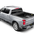 Load image into Gallery viewer, Roll-N-Lock 2019 Chevy Silverado 1500 68-3/8in E-Series Retractable Tonneau Cover - Back View