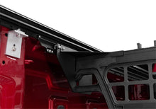 Load image into Gallery viewer, Roll-N-Lock 2019 Chevy Silverado / GMC Sierra 1500 68in Cargo Manager - Installation View