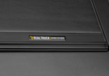 Load image into Gallery viewer, Roll-N-Lock 2019 RAM 1500 65-1/2in M-Series Retractable Tonneau Cover - Additional View 8