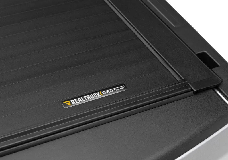 Roll-N-Lock 2019 Ram 1500-3500 (3)(5)(18) SB 74.5in A-Series Retractable Tonneau Cover - Side View