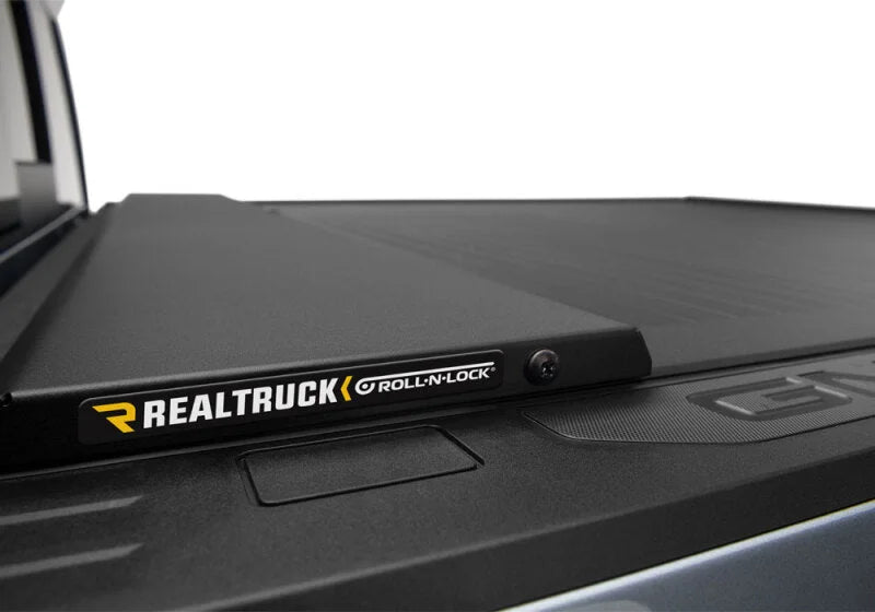 Roll-N-Lock 2020 GM Silverado / Sierra 2500/3500 6ft 10in Bed A-Series Retractable Tonneau Cover - Back View