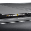 Load image into Gallery viewer, Roll-N-Lock 2022 Toyota Tundra (66.7in. Bed Length) A-Series XT Retractable Tonneau Cover - Side View