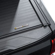 Load image into Gallery viewer, Roll-N-Lock 2022+ Toyota Tundra Ext Cab (78.7in.) A-Series XT Cover - Installation View