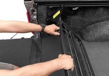 Load image into Gallery viewer, Roll-N-Lock 2024 Ford Ranger 5ft Bed Cargo Manager - Installation View