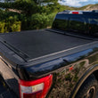 Load image into Gallery viewer, Roll-N-Lock 2024 Toyota Tacoma 6ft M-Series Retractable Tonneau Cover - Side View