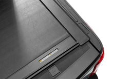 Load image into Gallery viewer, Roll-N-Lock 21-22 Ford F150 (w/o OE Cargo Tracks - 78.9in. Bed) M-Series Retractable Tonneau Cover - Installation View