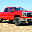 Load image into Gallery viewer, Rough Country 2 Inch Leveling Kit | Aluminum | Red | Chevy/GMC 1500 Truck (07-18) SUV (07-20) 1313 - Side View
