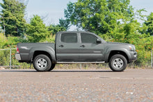 Load image into Gallery viewer, Rough Country 2 Inch Leveling Kit | Aluminum | Red | Toyota Tacoma 2WD/4WD (2005-2023) 744RED - Installation View