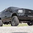 Load image into Gallery viewer, Rough Country 2 Inch Leveling Kit | Leaf Block | Ford F-250/F-350 Super Duty 4WD (99-04) 49800 - Side View
