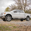 Load image into Gallery viewer, Rough Country 2 Inch Leveling Kit | Red | Ford F-150 2WD/4WD (2009-2013) 568RED - Side View