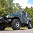 Load image into Gallery viewer, Rough Country 2 Inch Lift Kit | M1 | Jeep Wrangler TJ (97-06)/Wrangler Unlimited (04-06) 65840