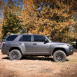 Load image into Gallery viewer, Rough Country 2 Inch Lift Kit | Red Spacers | Toyota 4Runner 2WD/4WD (2010-2024) 764RED - Installation View