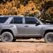 Load image into Gallery viewer, Rough Country 2 Inch Lift Kit | Red Spacers | Toyota 4Runner 2WD/4WD (2010-2024) 764RED - Installation View