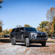 Load image into Gallery viewer, Rough Country 2 Inch Lift Kit | Red Spacers | Toyota 4Runner 2WD/4WD (2010-2024) 764RED - Installation View