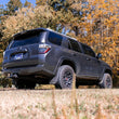 Load image into Gallery viewer, Rough Country 2 Inch Lift Kit | Red Spacers | Toyota 4Runner 2WD/4WD (2010-2024) 764RED - Installation View