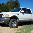 Load image into Gallery viewer, Rough Country 2.5 Inch Leveling Kit | Ford F-150 4WD (1997-2003) 7544 - Installation View