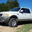 Load image into Gallery viewer, Rough Country 2.5 Inch Leveling Kit | Ford F-150 4WD (1997-2003) 7544 - Installation View