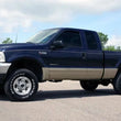 Load image into Gallery viewer, Rough Country 2.5 Inch Leveling Kit | Leaf Spring | Ford F-250/F-350 Super Duty 4WD (99-04) 489.20 - Installation View