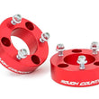 Load image into Gallery viewer, Rough Country 2.5 Inch Leveling Kit | Red Spacers | Nissan Frontier (05-24)/Xterra (05-15) 865RED - Kit Contents